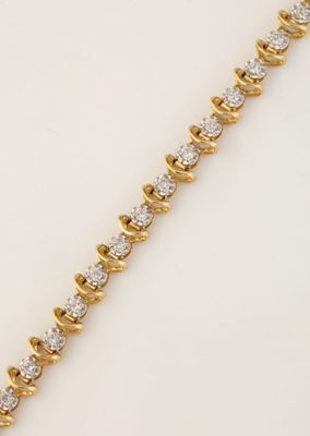 un bracelet en or jaune et diamants