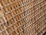 a close up view of a wall made of bamboo sticks