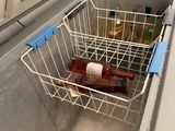a cooler with a bottle of beer inside of it
