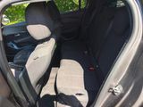 the back seats of a car are empty in the parking lot