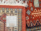 an image of a close up of a rug with a tag on it