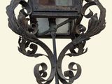 a picture of a decorative light hanging on the wall