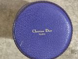 a close up of a blue box with a name on it
