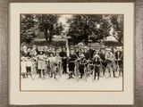 black and white photograph of a group of people posing for a picture