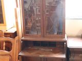 several pieces of furniture are sitting in a room with a window