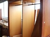 an image of a room with a table and chairs