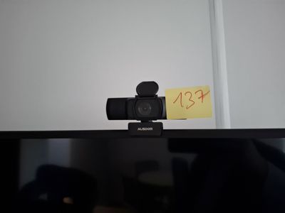 a video camera that is sitting on top of a monitor