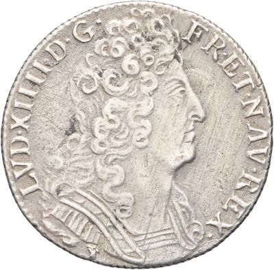 une pièce d'argent sur laquelle figure l'effigie d'une femme coiffée d'une couronne