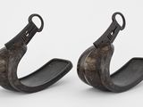 paire de boucles d'oreilles plaquées bronze au design incurvé