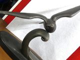 a statue of a bird that is sitting on a table