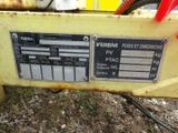 a close up of a sign on the side of a yellow machine