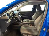 the interior of a blue car is clean and ready to be used