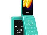 an image of a green flip phone sitting next to a white background