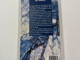 the cover of a book with a picture of a blue and white marble pattern