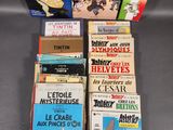 several books are stacked on top of each other on a table