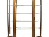 an image of a corner display case with glass shelves