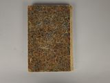 a small book that is sitting on a table