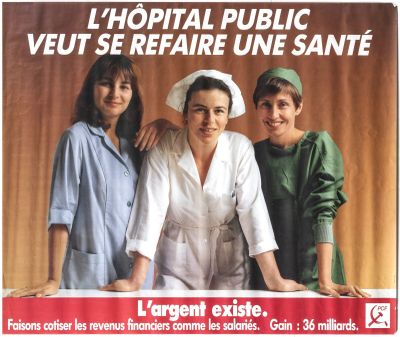 three women standing next to each other in front of a poster
