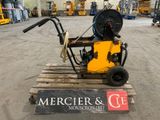 a machine that is sitting on a pallet in a warehouse