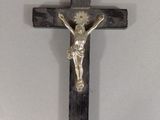 a wooden cross with a crucifix on it