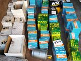 many boxes of various types of electrical equipment on the floor
