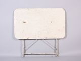an image of a small white table on a metal stand