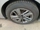 a close up of a tire on a car ' s rim