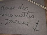 a message written on a piece of fabric hanging on a wall