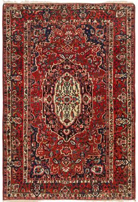 a red rug with a medallion design on a white background