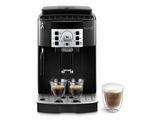 une machine à café avec deux tasses de café à côté