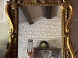 a person taking a picture of themselves in a mirror