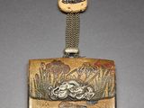 an image of a purse with a frog on it