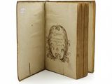 an open book with a drawing on the inside of it