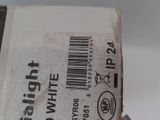 a white box with a barcode on it sitting on a table