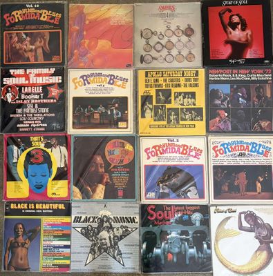 many different types of vinyl records on the wall