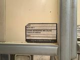 a sign on the door of a cell phone booth