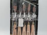 four different types of paint brushes in a package on a white background
