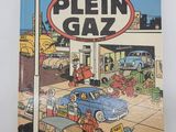 a close up of a book on a table with a car in the background