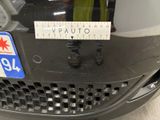 a sticker on the front of a car that has a sticker attached to it