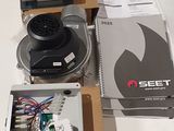 boxes of electronic equipment sitting on top of a table next to each other
