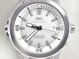 a silver watch with roman numerals on the face