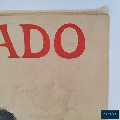 an old book with a picture of a man on it