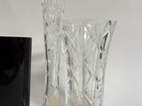 two vases that are sitting next to each other on a table