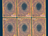 four square coasters with a picture of a black hole in the middle of them