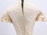 the back of a woman ' s dress on a mannequin mannequin mannequin mannequin mannequin mannequin mannequin mann