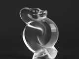a close up of a glass sculpture of a bird on a black background