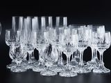 a lot of empty wine glasses sitting on a table