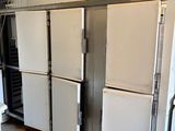 several refrigerators are lined up in a kitchen with white tile flooring