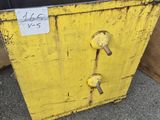 a yellow box that has a tag on it