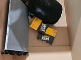 a box that has a radiator and a bag of luggage in it